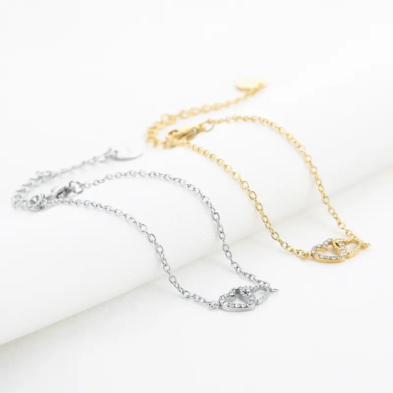 Bijoutheek Armband (Sieraad) 2 Hartjes Witte Stenen