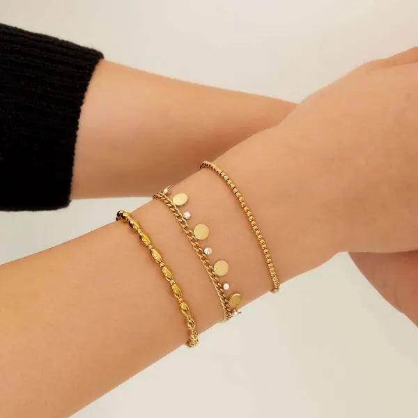 Bijoutheek Armband (sieraad) Discs en witte stenen