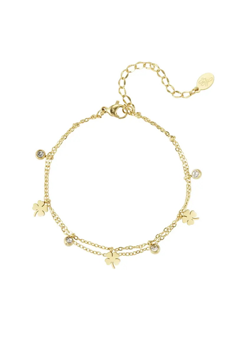 Charm bracelet with clover and diamond
