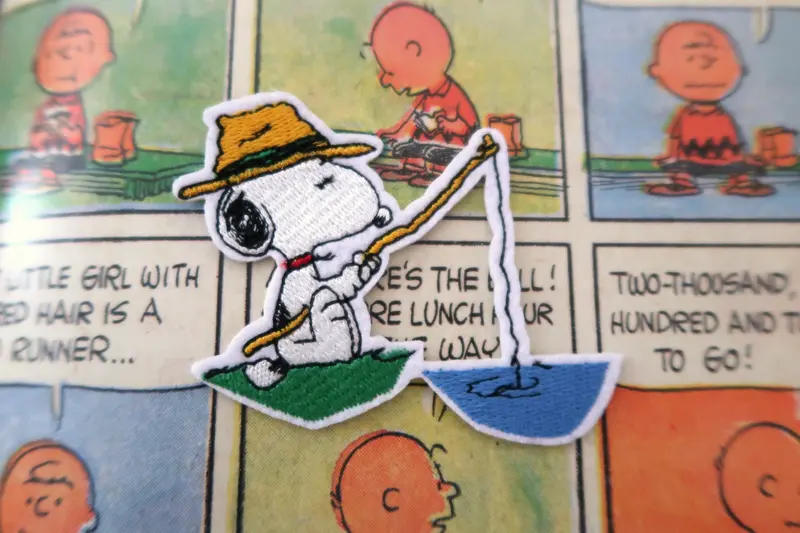 Fishing Snoopy Peanuts comic embroidered patch/appliqué