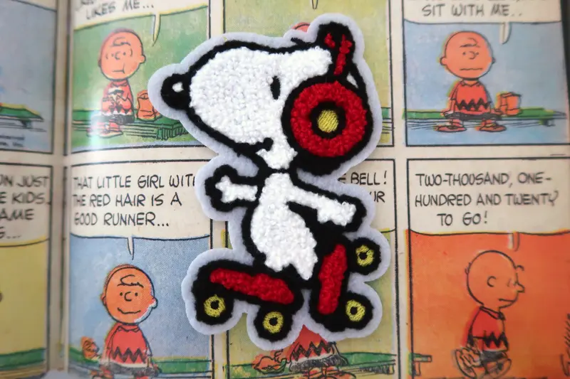 Fluffy Rollerskating Snoopy Peanuts comic embroidered patch/appliqué