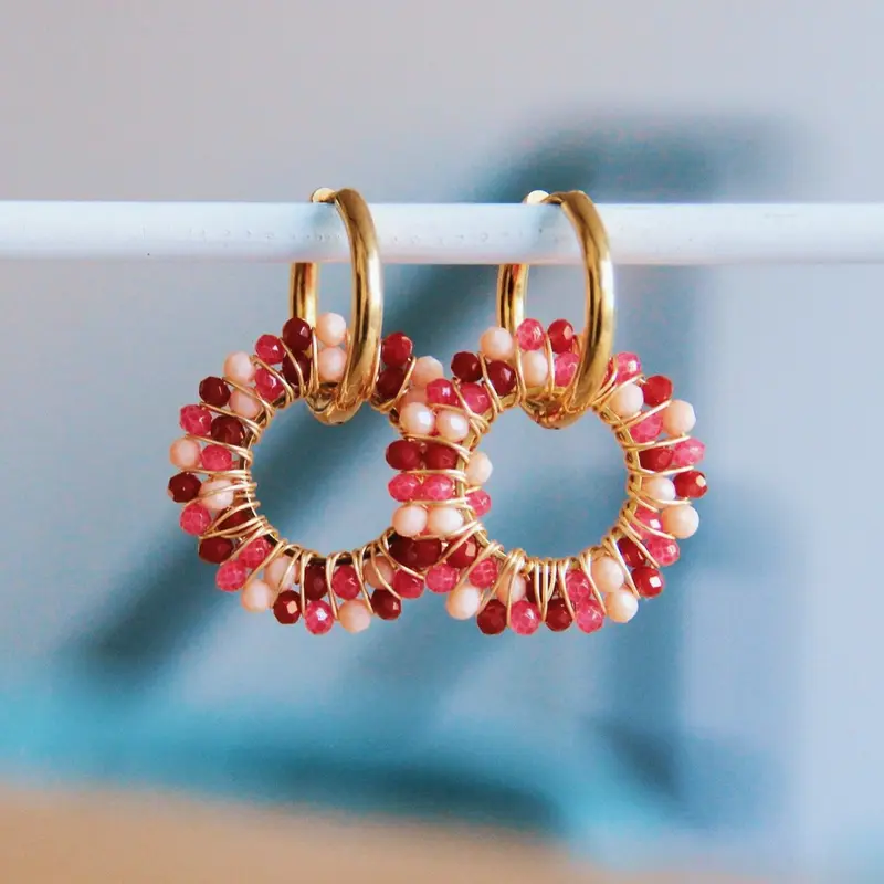 Gouden oorbellen dames - met ronde facet hanger