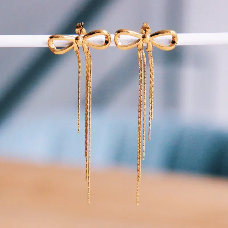 Gouden oorbellen dames - met strikje