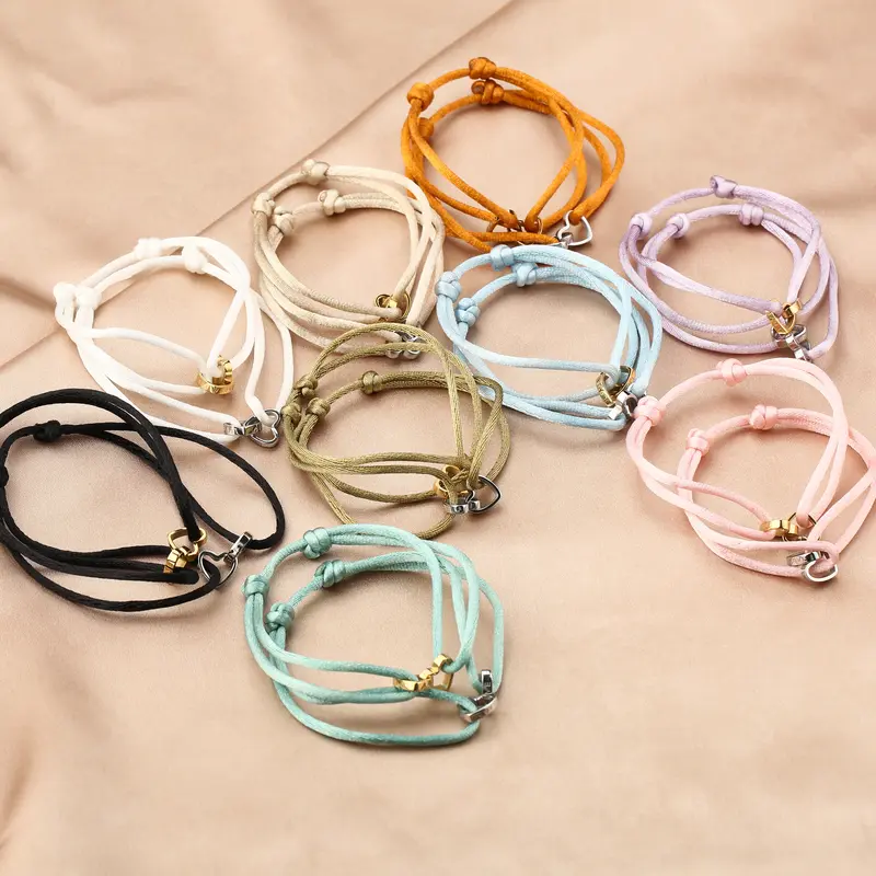 Michelle Bijoux armband twee hartjes goud touw (one size)