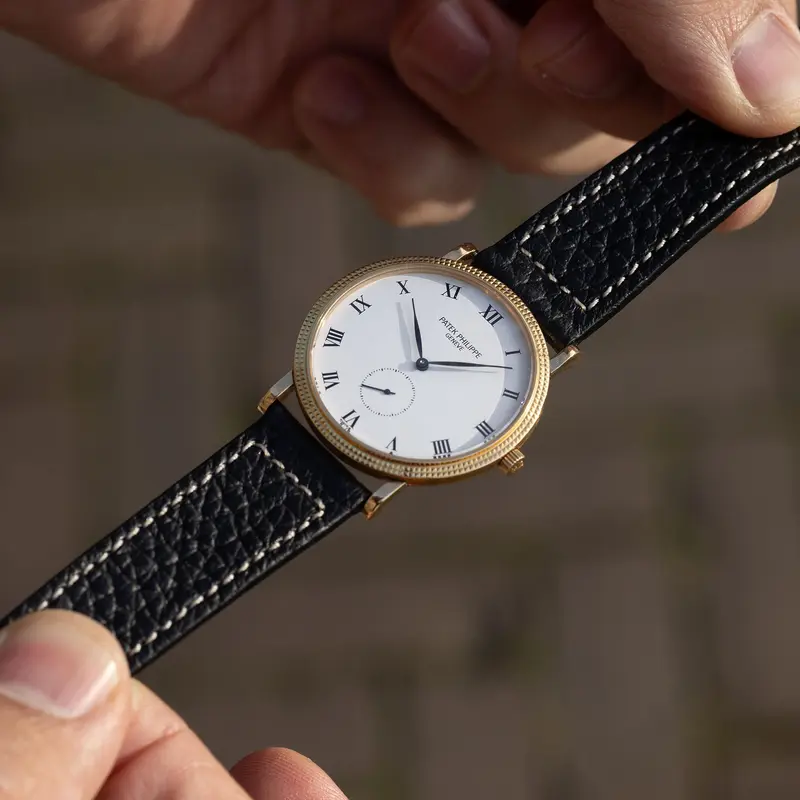 Patek Calatrava Porcelain Dial Clous de Paris 18k Yellow Gold Case with Extract from the Archives ref. 3919