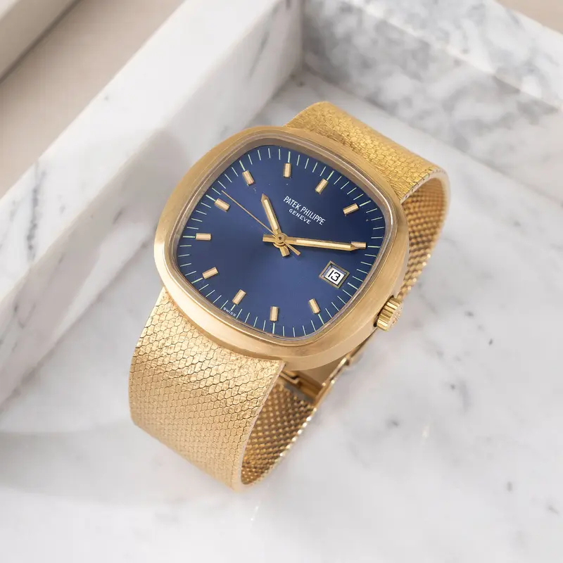 Patek Philippe Beta 21 18 Karat Gelbgold TV Gehäuse mit blauem Zifferblatt Referenz 3587-1