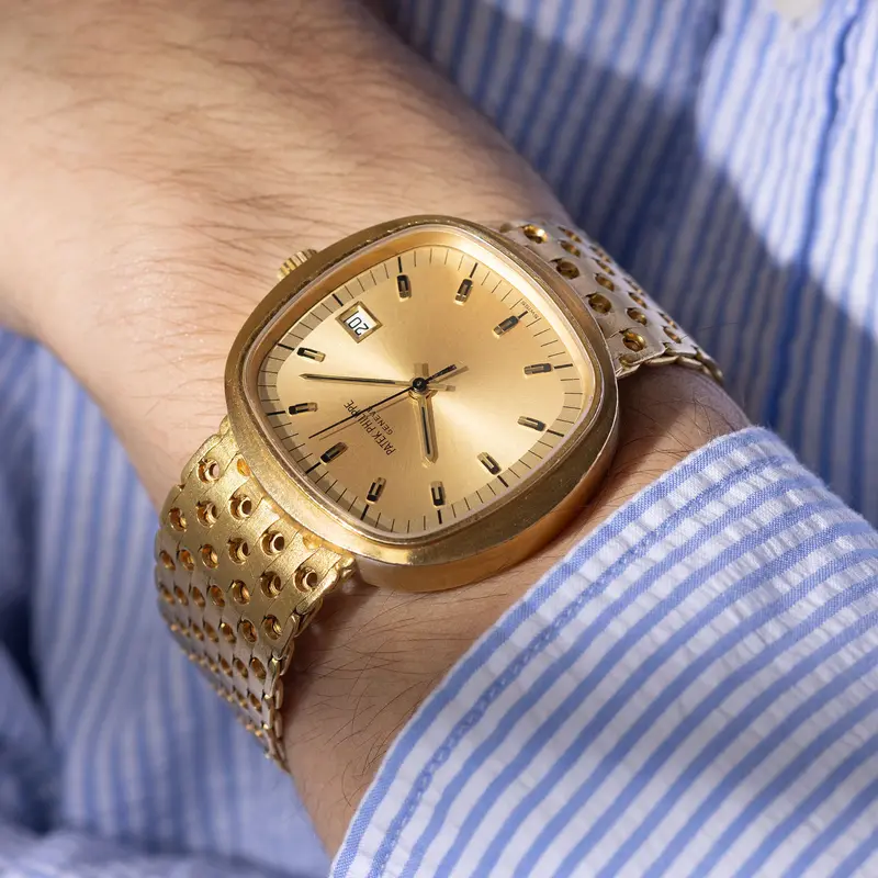 Patek Philippe Beta 21 18 Karat Gelbgold TV Gehäuse mit integriertem Armband Referenz 3587-2