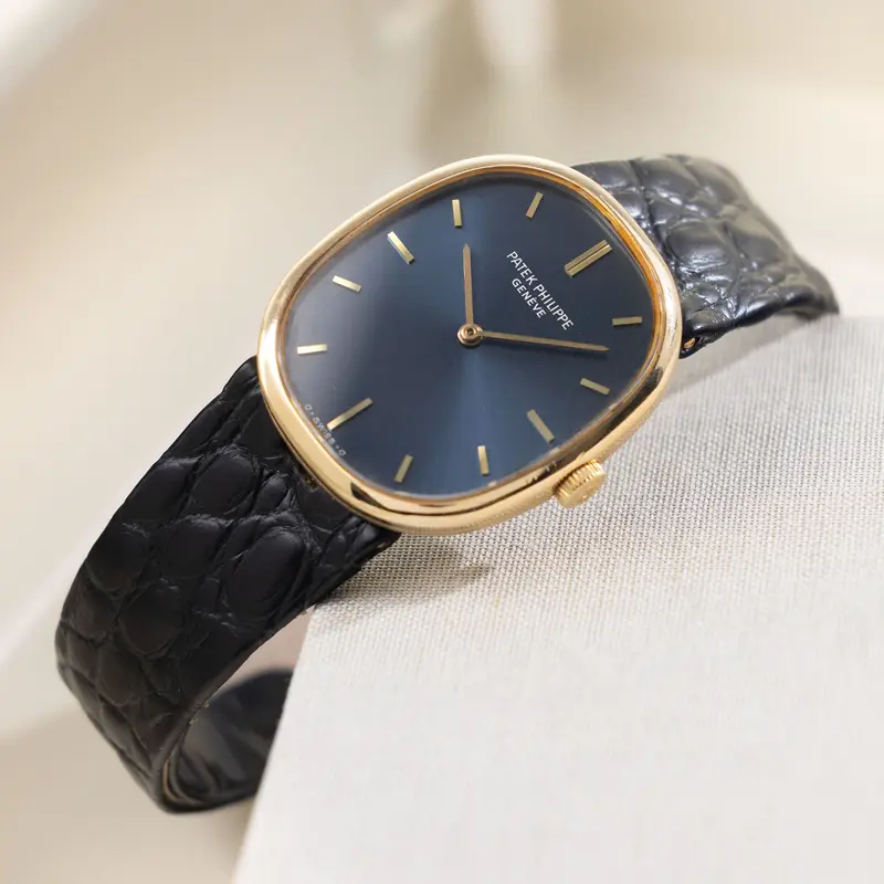 Patek Philippe Ellipse D'Or 3648J Blue Soleil Sigma Dial in 18k Yellow Gold with Original Box