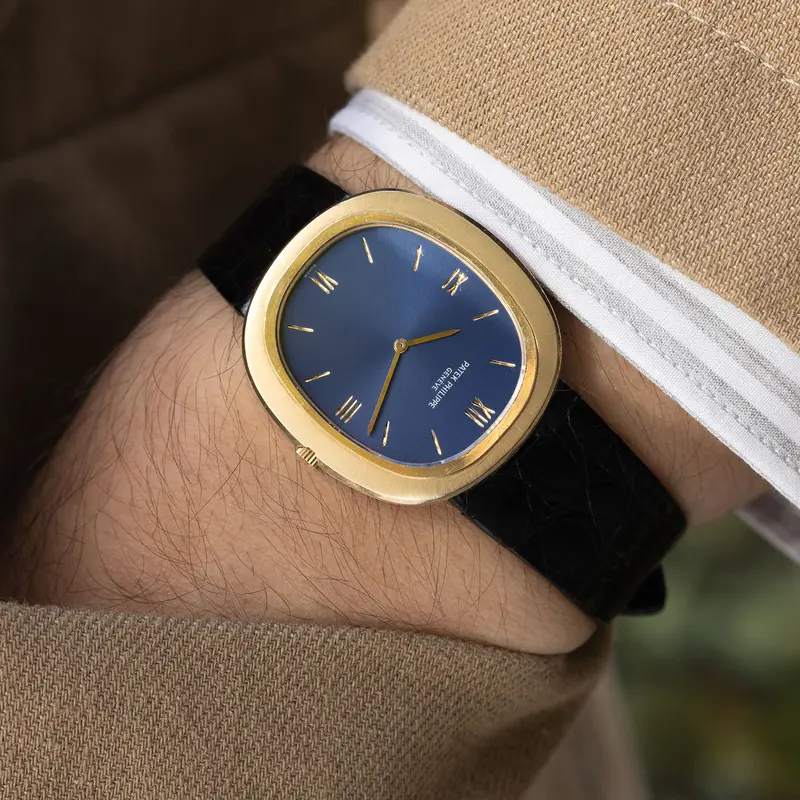 Patek Philippe Ellipse Referenz 3589 Gelbgold mit blauem Soleil Zifferblatt