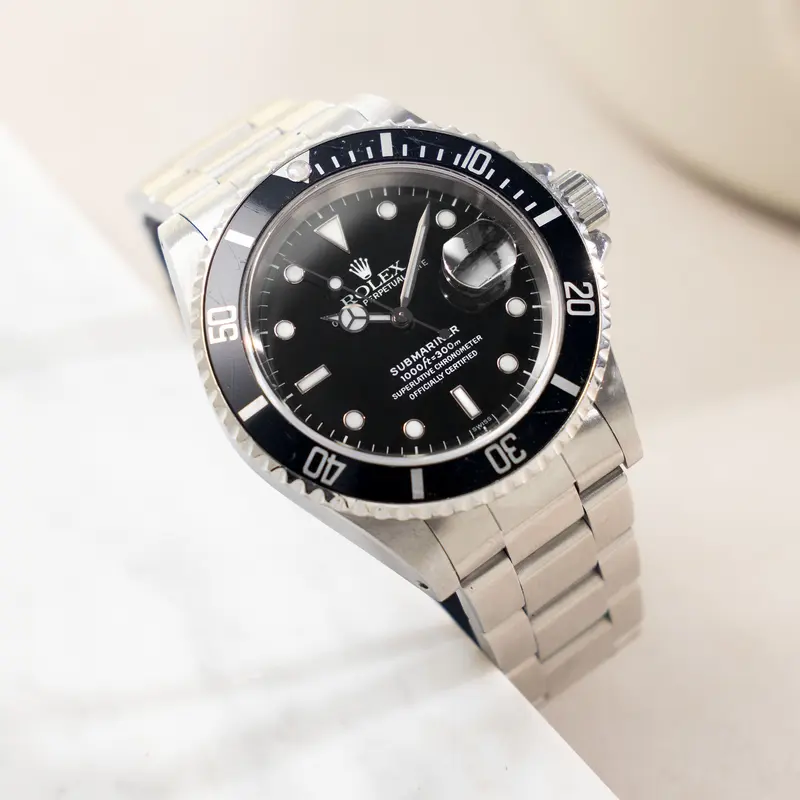 Rolex Submariner Date 16610 Swiss Only Dial with Original Guarantee Paper