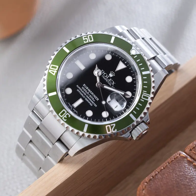 Rolex Submariner Date 16610LV 50th Anniversary Grüne Lünette mit Papieren