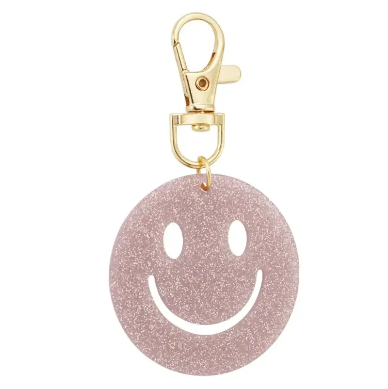 Sleutelhanger Keep Smiling goud lichtroze