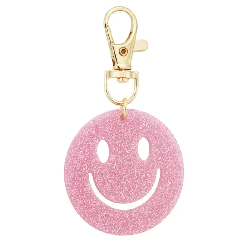 Sleutelhanger Keep Smiling goud roze