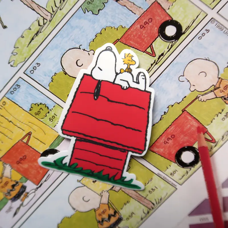Snoopy Vinyl Sticker // Snoopy from Peanuts comics Sleeping on Dog House Glossy Vinyl Sticker