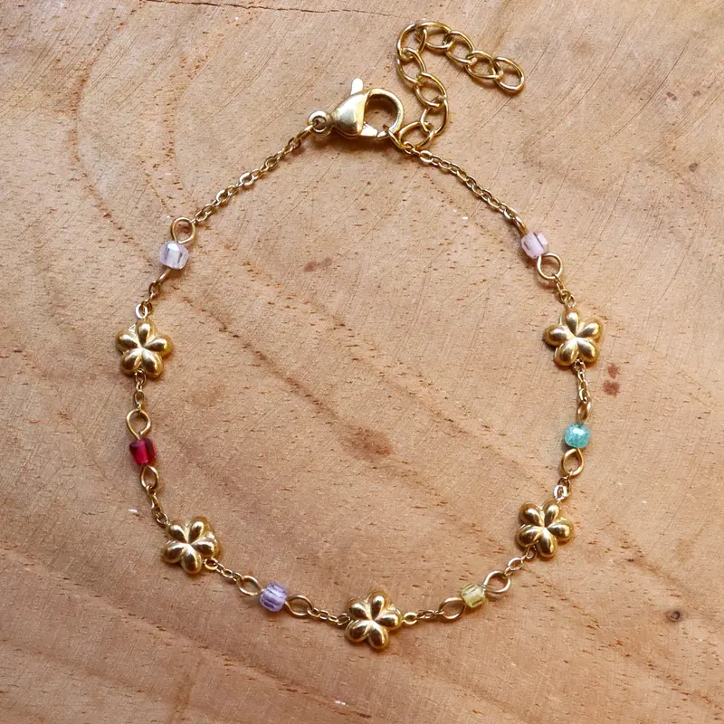 Stainless steel armband bloemetjes en kralen goud