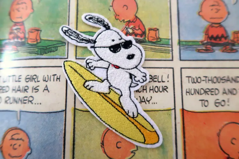 Surfing Snoopy Peanuts comic embroidered patch/appliqué